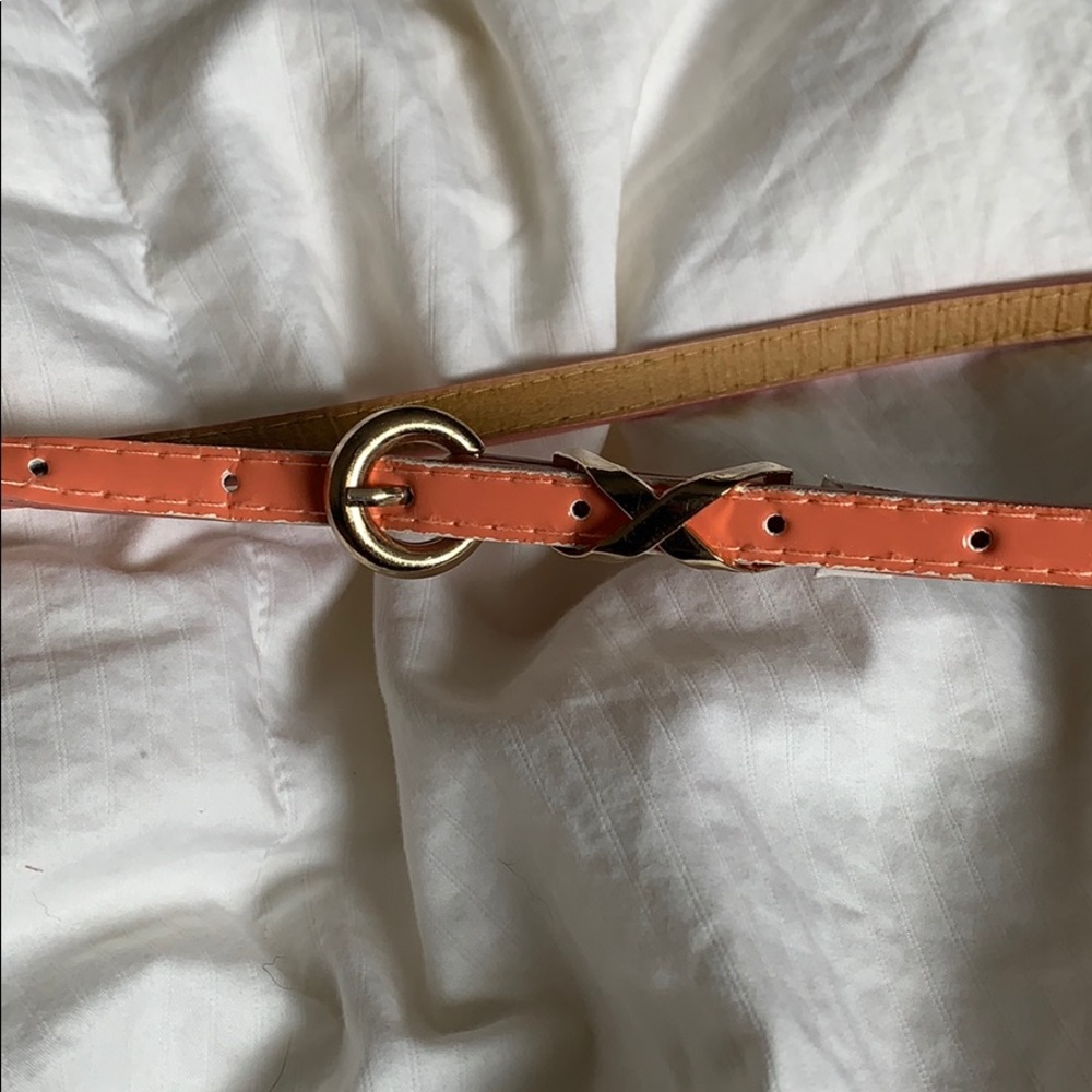 Pink thin belt with gold buckle